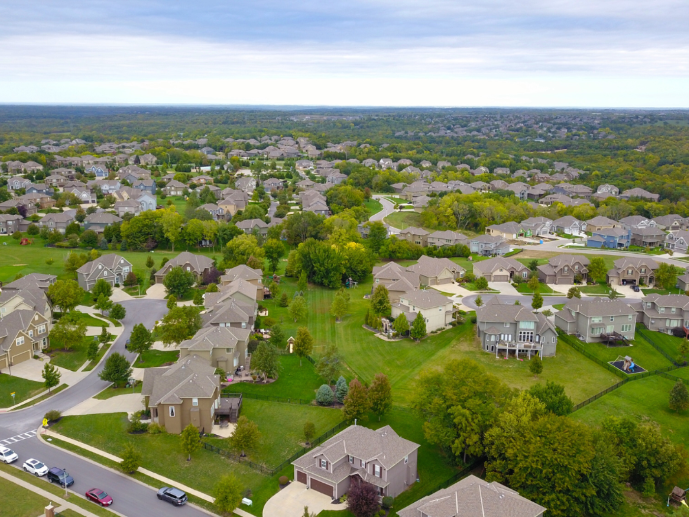 Generic aerial photo of several neighborhoods of houses.