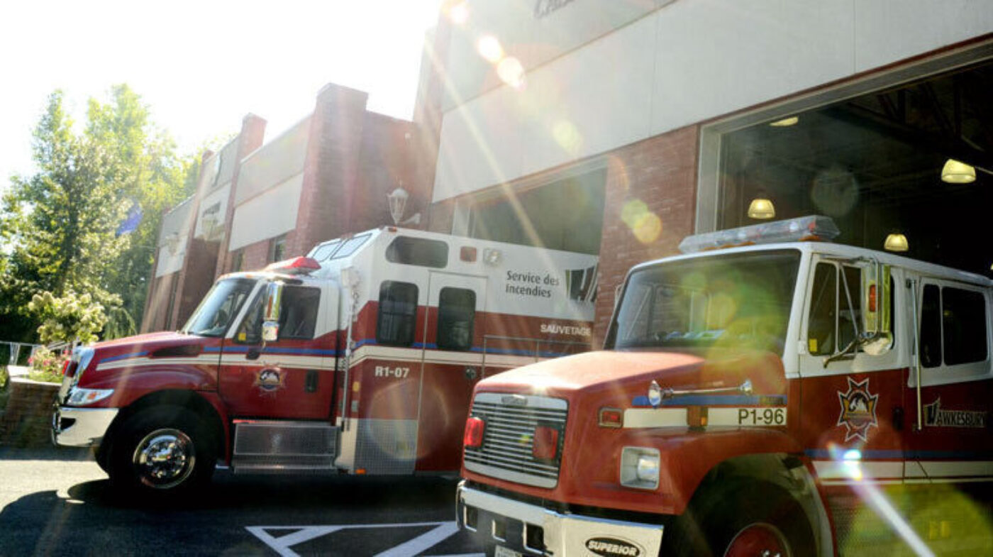 Photo of the Town of Hawkesbury fire department building and trucks.