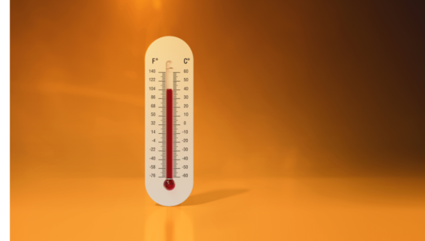 Generic image of an alcohol thermometer in front of an orange background