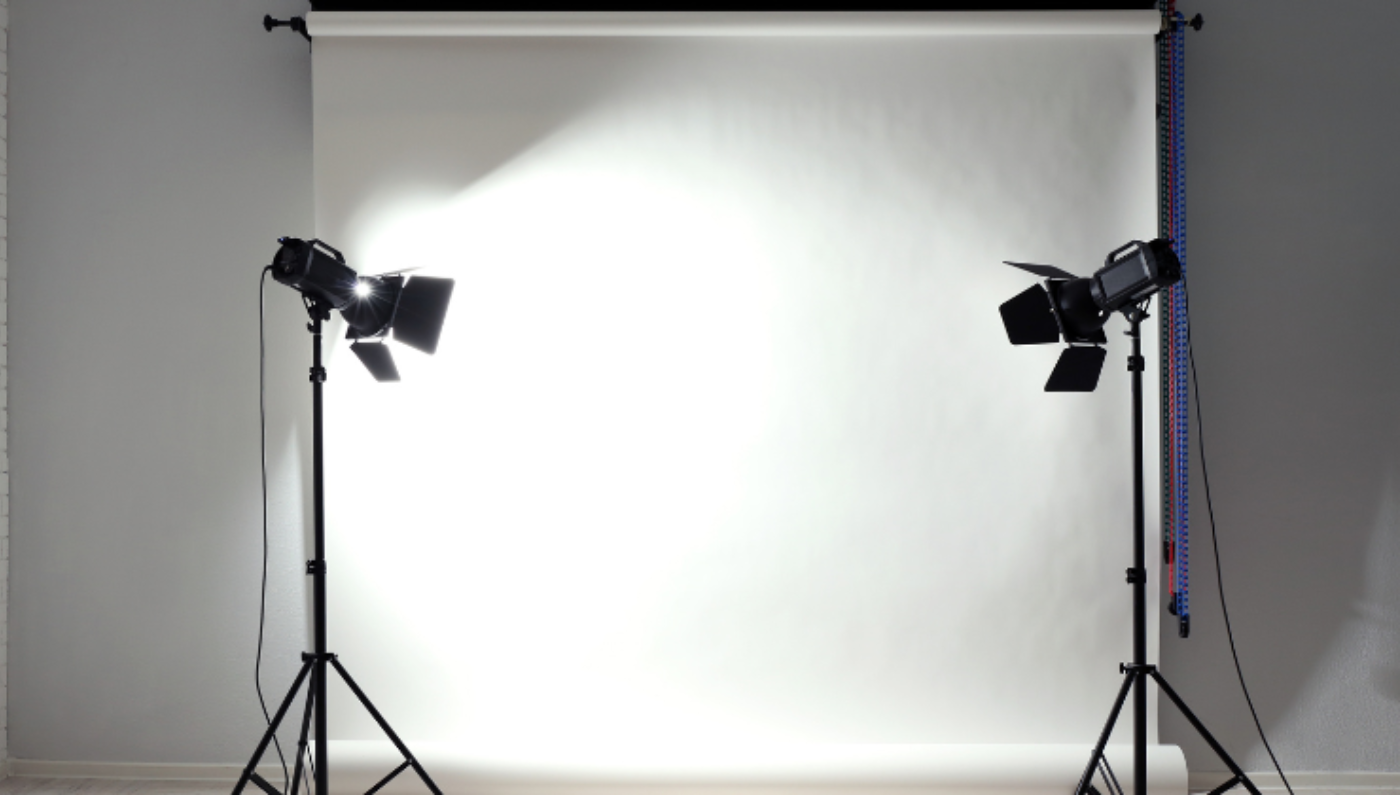 Generic image of a white photography backdrop with two spotlights