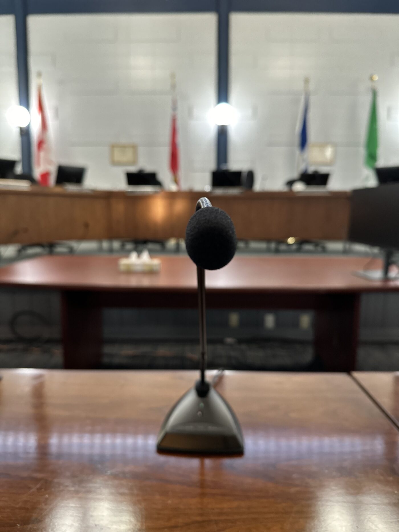 Close-up of a microphone in the council chamber