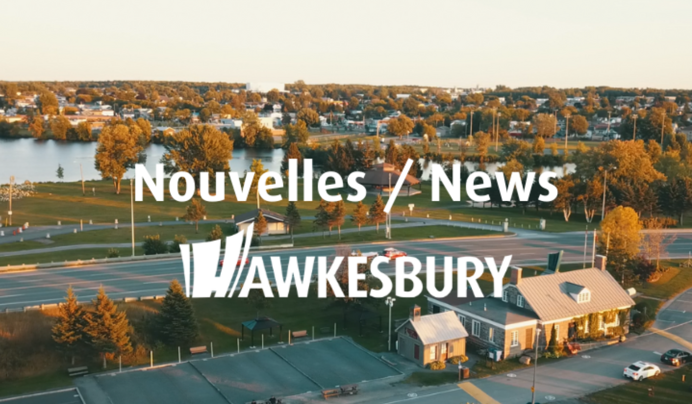 Aerial photo of the Town of Hawkesbury with the text ‘'Nouvelles/News’' and the white town logo.