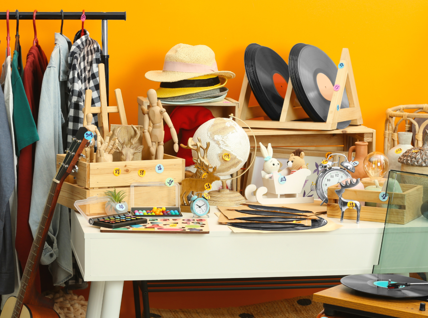 Generic photo of objects and clothing for sale at a garage sale